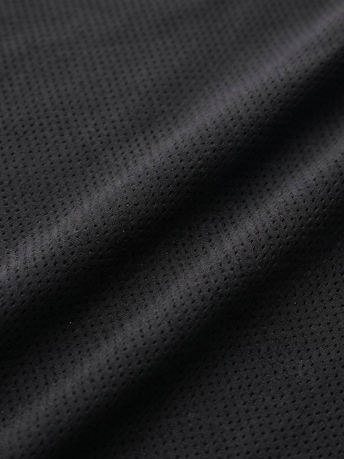 Huggster Brief, close-up van de zwarte stof